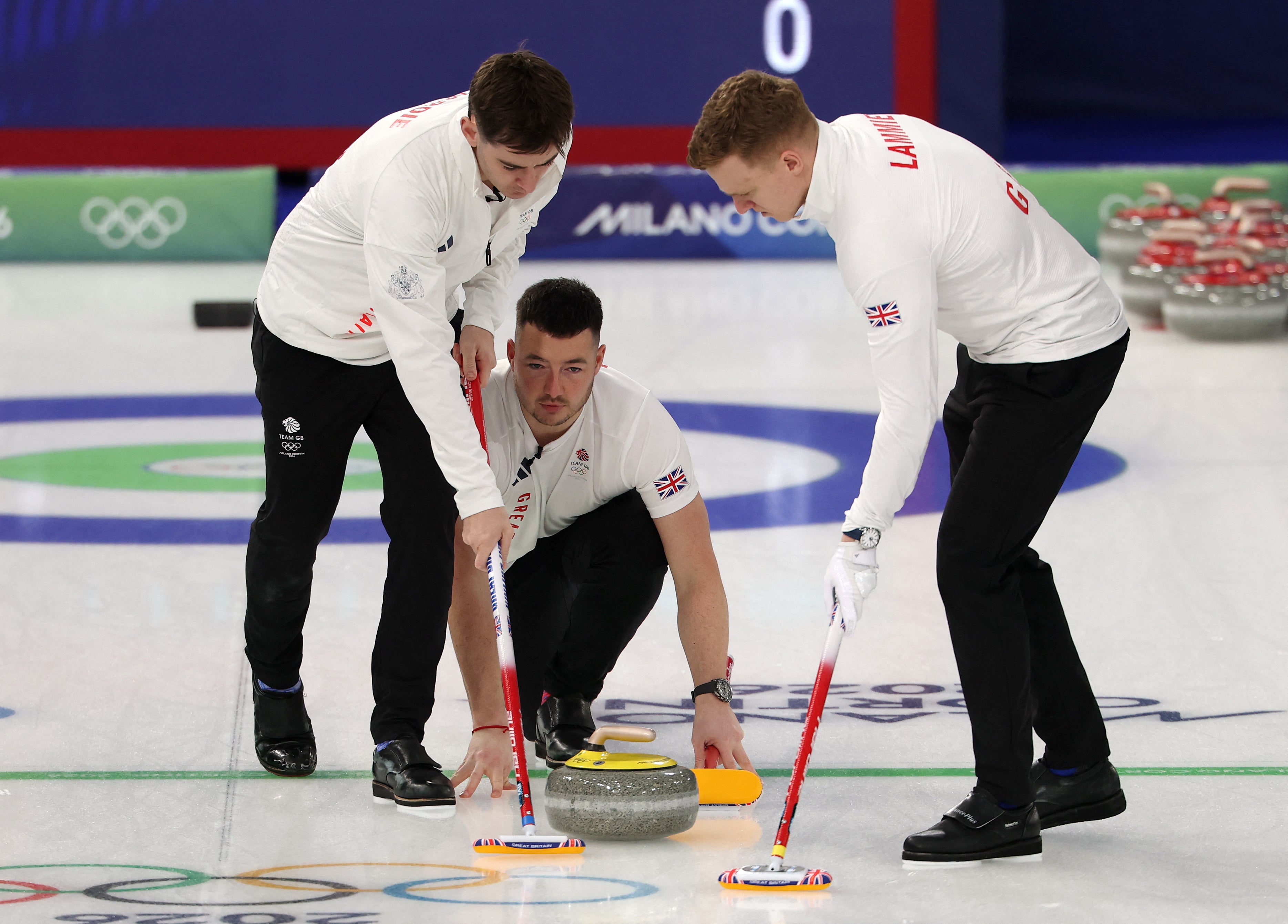 Боби Лами из Британије, Грант Хардие из Британије и Хамми МцМиллан из Британије у акцији