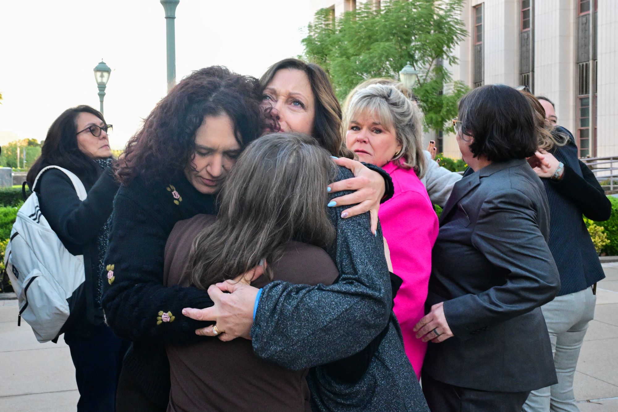 Parents and family members were seen embracing outside the Los Angeles Superior Court ahead of Zuckerberg's testimony on Wednesday