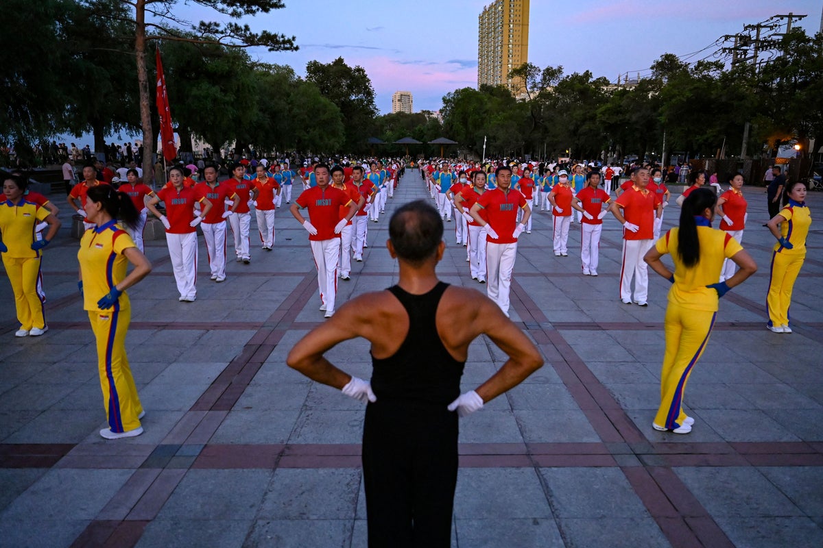 https://static.independent.co.uk/2026/02/18/3/34/Local-residents-taking-part-in-an-aerobics-exercise-at-a-square-in-Jiamusi-in-northeastern-Chinas-He.jpeg?width=1200&height=800&crop=1200:800