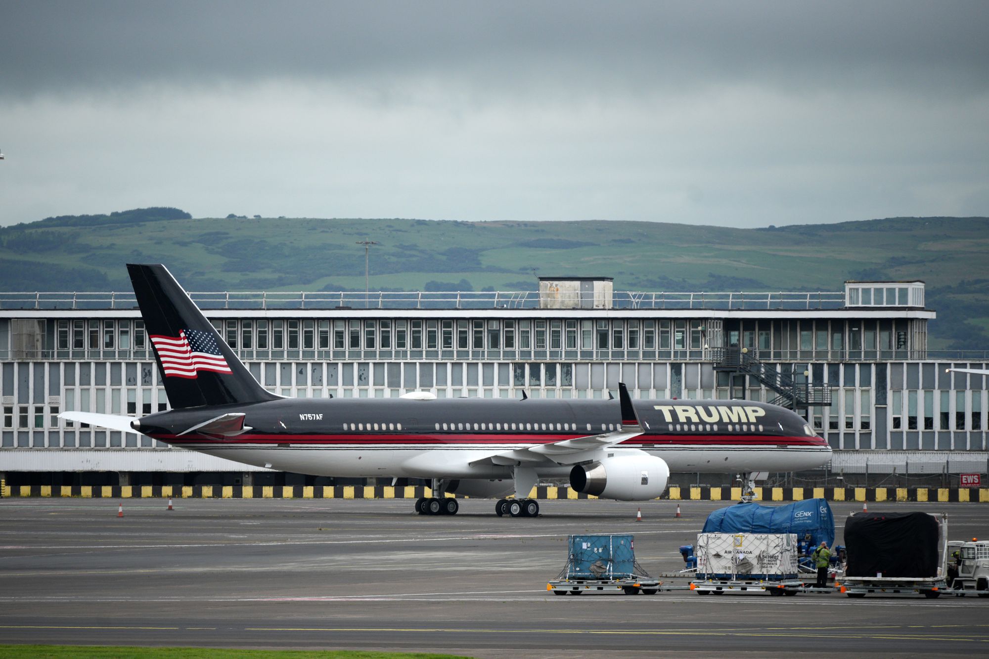 President Donald Trump's personal jet, often referred to as 'Trump Force One,' has a dark blue body with a red stripe