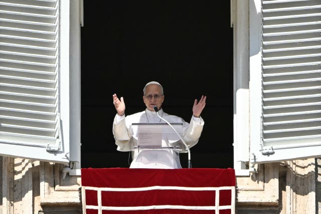 <p>Pope Leo XIV addresses the crowd from the window of the apostolic palace overlooking St Peter’s Square during the Angelus prayer in the Vatican on 15 February 2026</p>