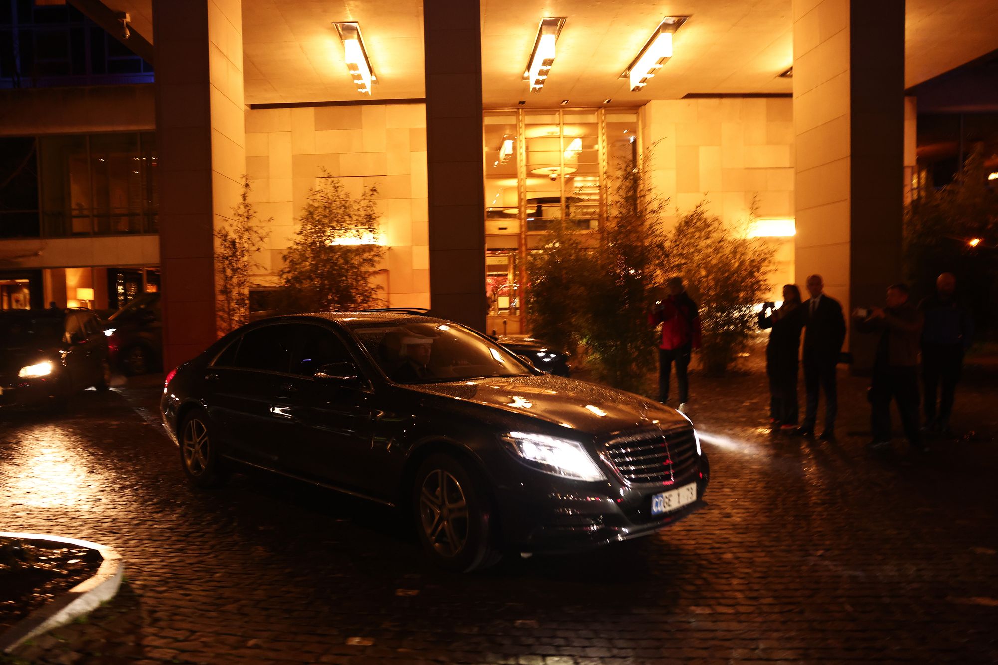 Officials leave after trilateral Ukraine peace talks held at the Intercontinental Hotel in Geneva