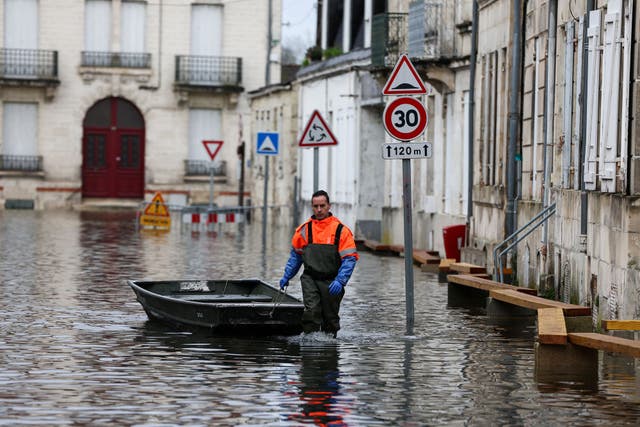<p>The Charente river burst its banks, bringing flooding to Saintes (pictured, Wednesday)</p>