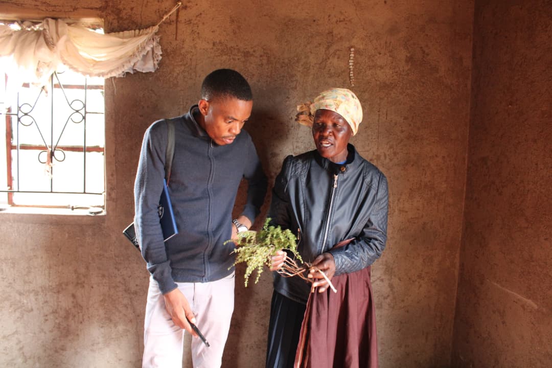 Amos Batisayi speaks to one of the female beneficiaries of Mwenezi District Center for Training (MDTC) in Zimbabwe. US funding for most of these programmes was cut by the Trump administration in 2025