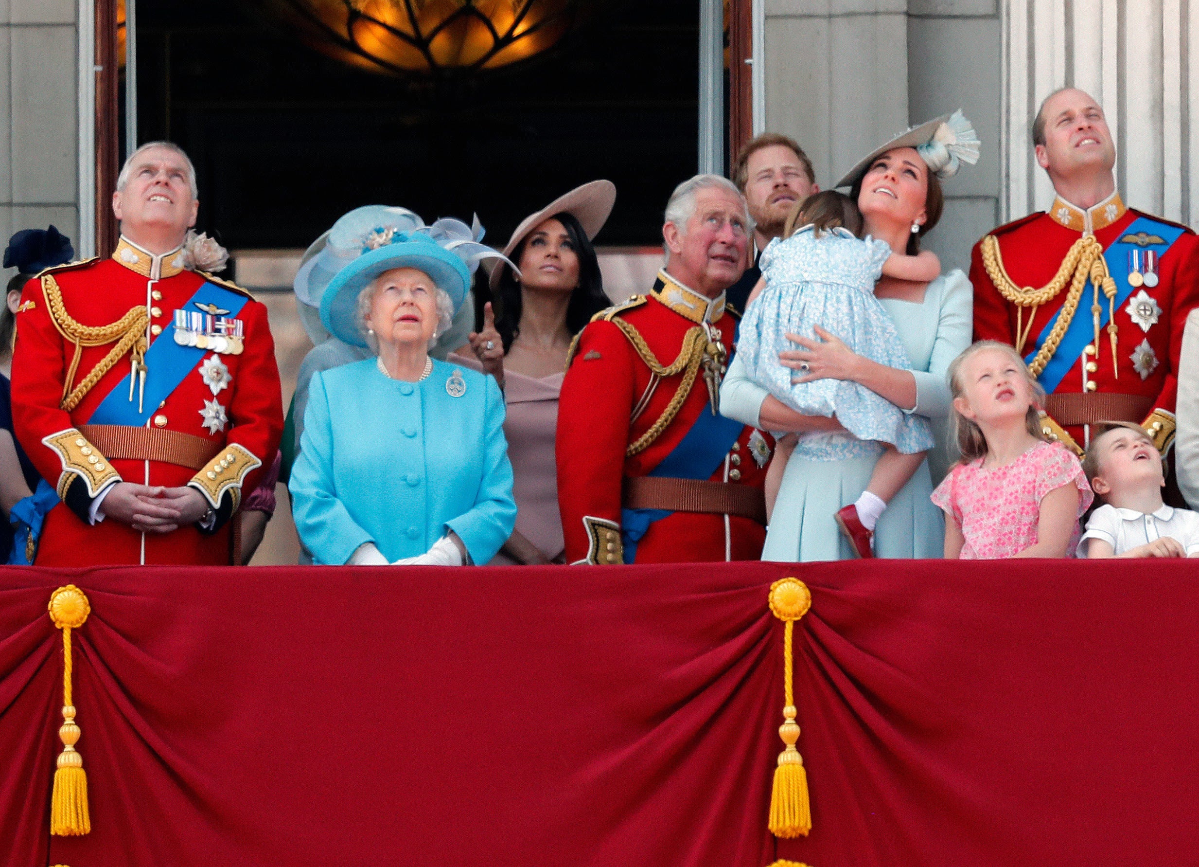 From left, Prince Andrew, Queen Elizabeth, Meghan Duchess of Sussex, Prince Charles, Prince Harry, Kate Duchess of Cambridge and Prince William attend the annual Trooping the Colour Ceremony in London, Saturday, June 9, 2018
