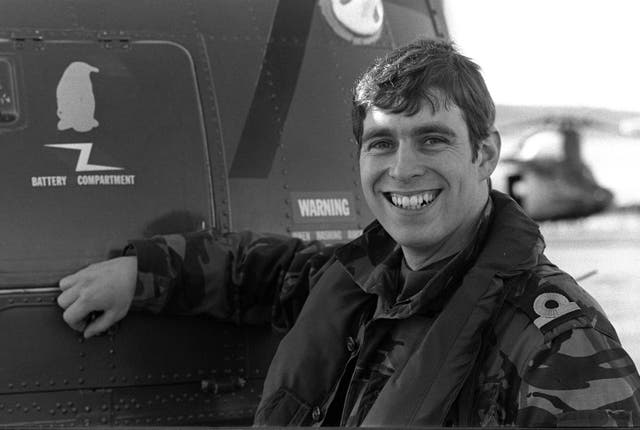 <p>The then-Prince Andrew at Port Stanley as a helicopter pilot with HMS Invincible in 1982 </p>
