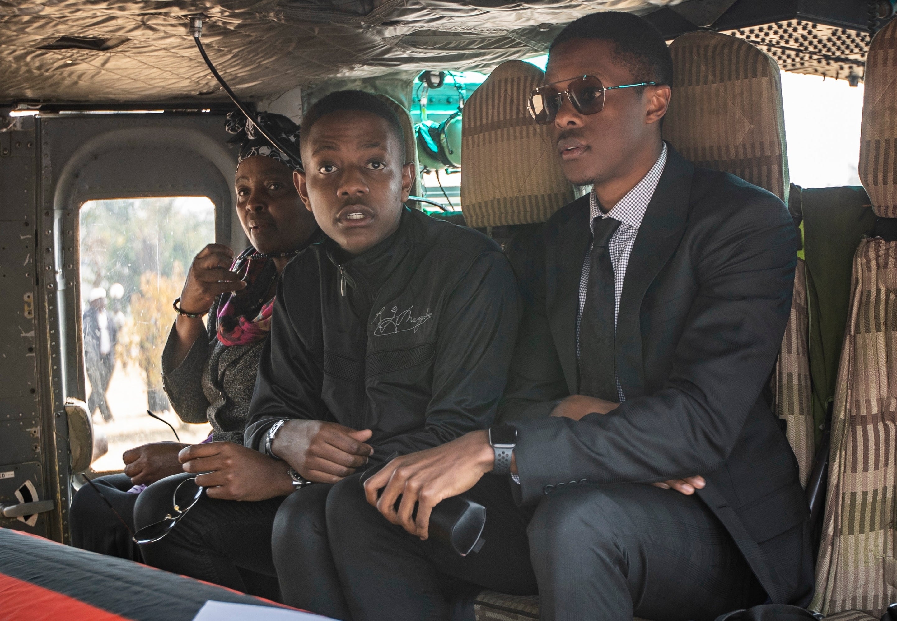 Robert Mugabe's son Bellarmine Chatunga Mugabe (centre) was reportedly detained after an incident at his house