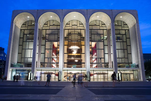 <p>FILE - The Metropolitan Opera house at Lincoln Center appears on Aug. 1, 2014, in New York. (AP Photo/John Minchillo, File)</p>