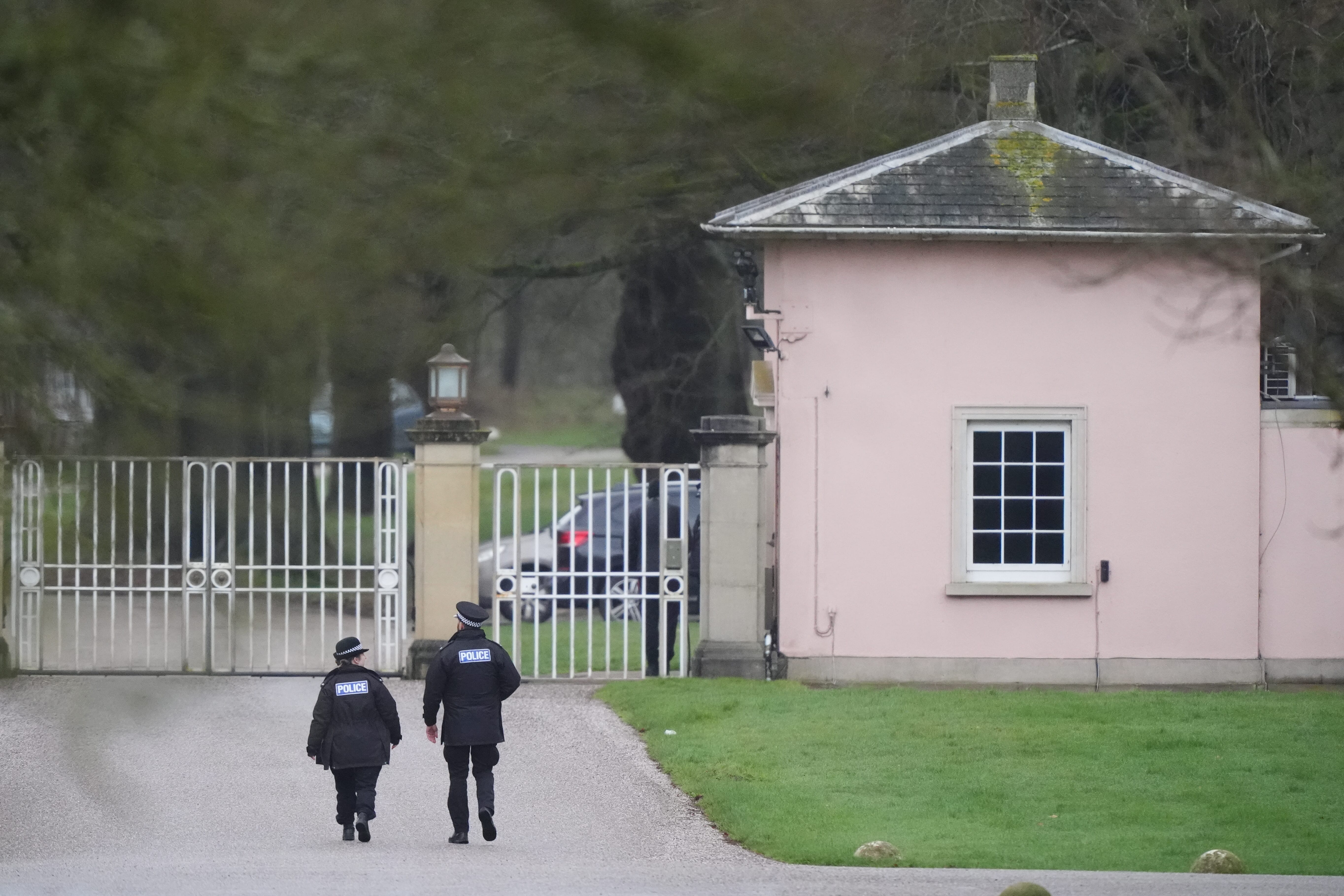 Police officers at Royal Lodge, the former home of Andrew Mountbatten-Windsor in Windsor, Berkshire