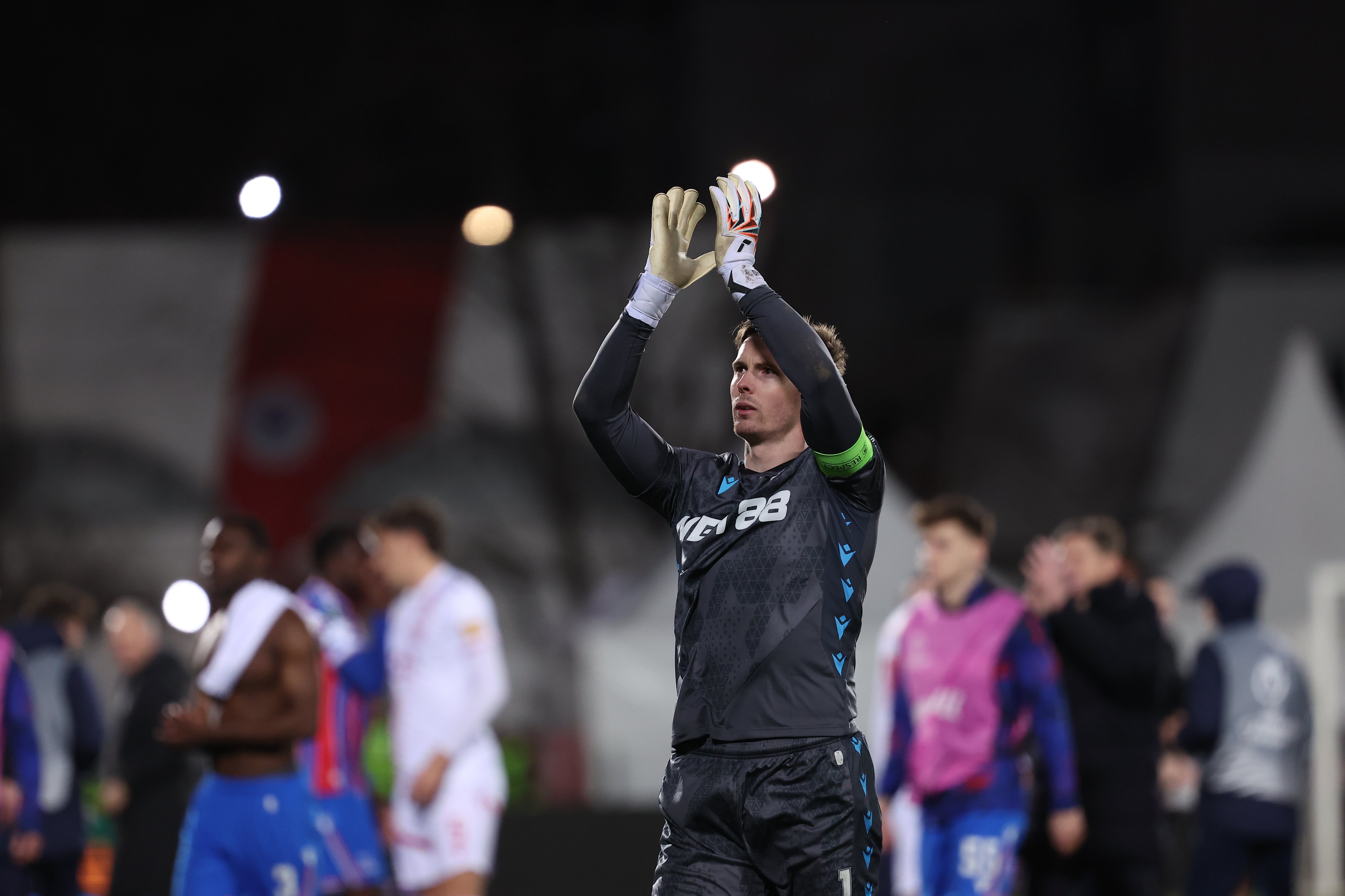 Crystal Palace’s goalkeeper Dean Henderson applauds the travelling fans at the end