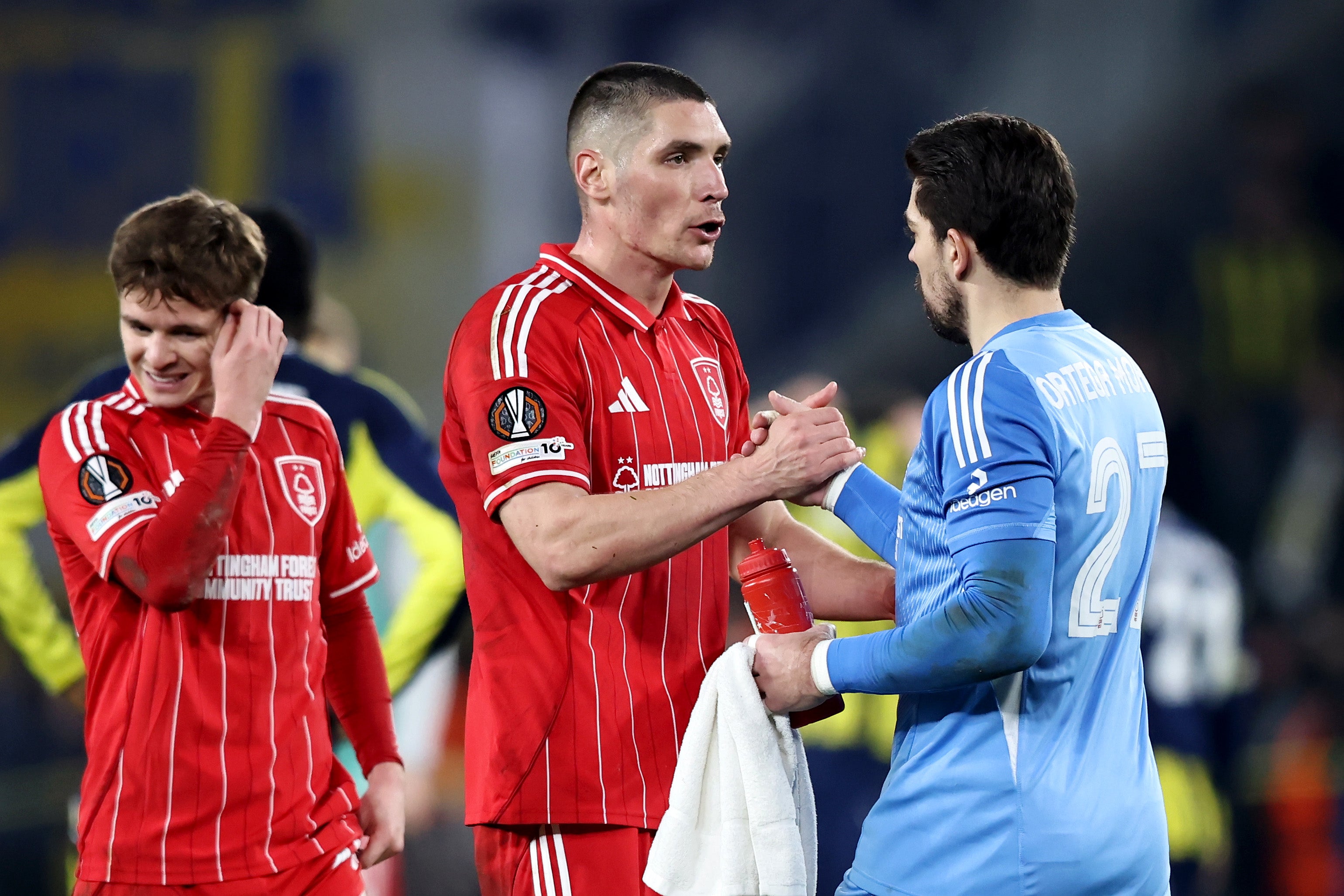 <p>Nikola Milenkovic (L) and Stefan Ortega of Nottingham Forest celebrate their win over Fenerbahce</p>