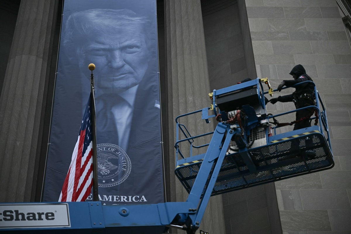 Giant Trump banner hanging outside DOJ building stirs strong reactions online: ‘Full blown North Korea vibes’