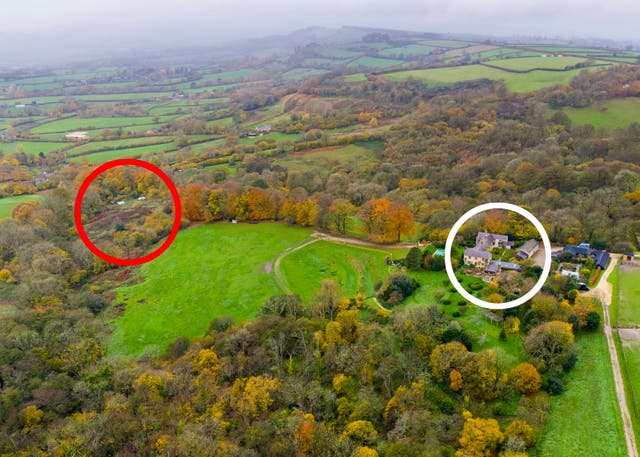 <p>View showing Martin Clunes house on the right and Theo Langtona's woodland travellers site on the left</p>