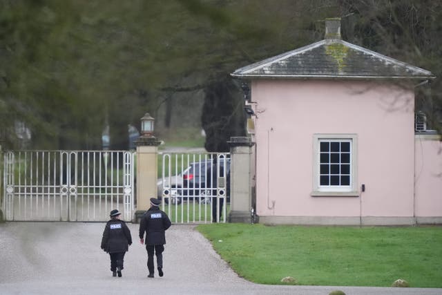 <p>Police officers at Royal Lodge, the former home of Andrew Mountbatten-Windsor in Windsor </p>