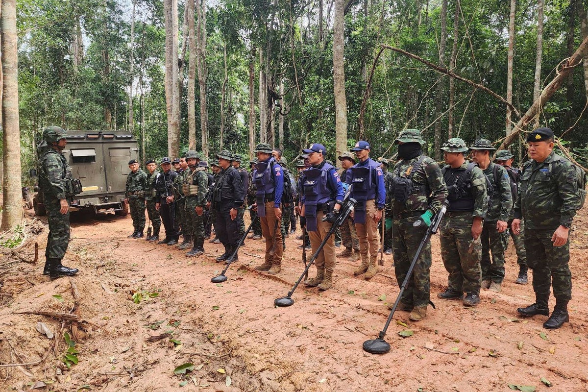 2 Cambodian journalists appeal treason convictions over a photo from Thai border clash