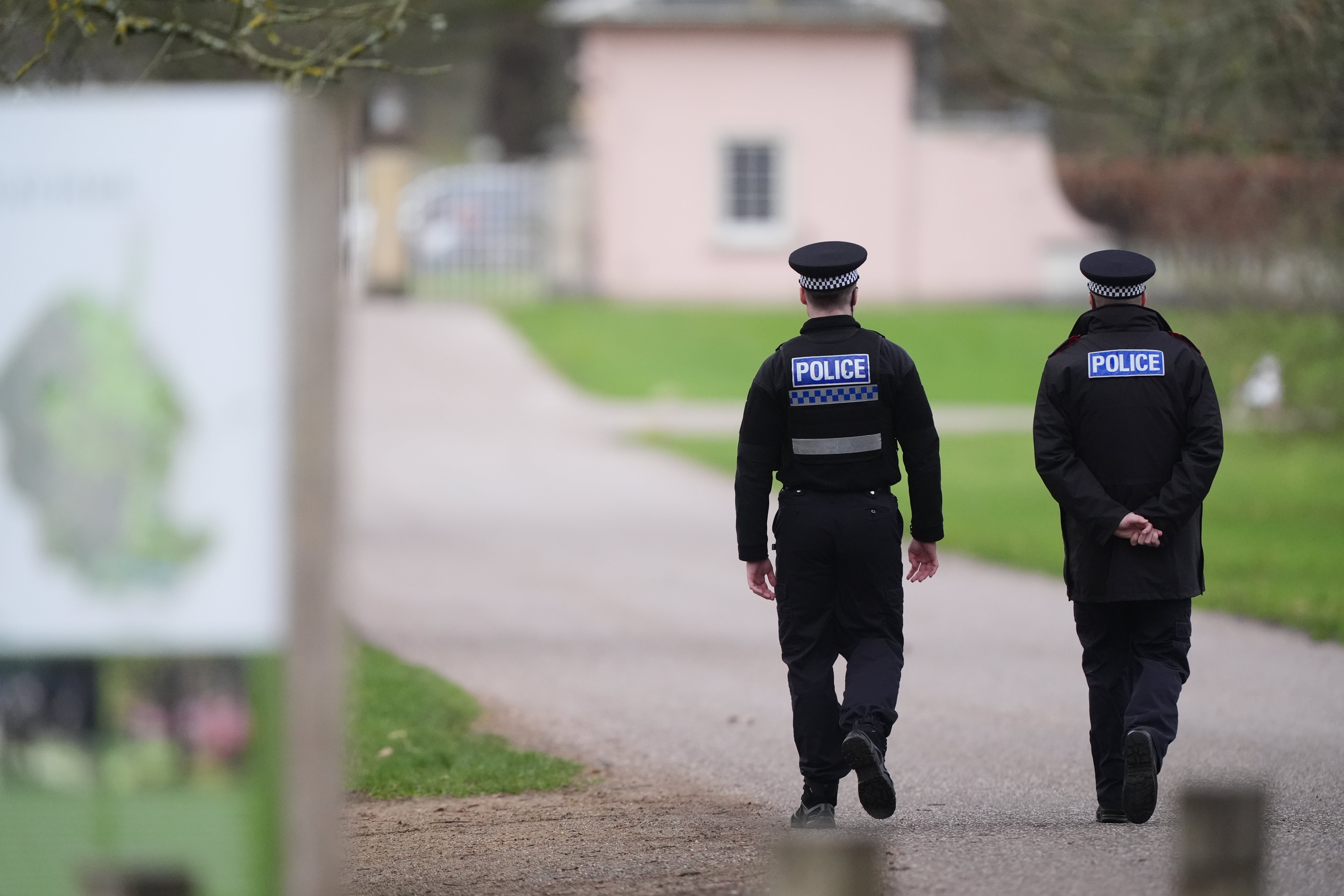 <p>Police officers at Royal Lodge, the former home of Andrew Mountbatten-Windsor (Jonathan Brady/PA)</p>
