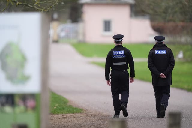 <p>Police officers at Royal Lodge, the former home of Andrew Mountbatten-Windsor (Jonathan Brady/PA)</p>