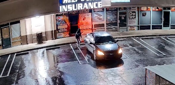 The suspects then fled the store in a dark-colored sedan, the video appears to show