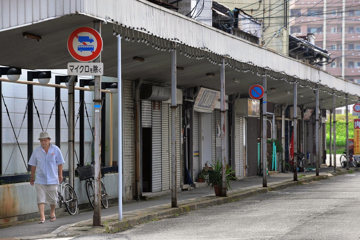 Japanese police arrest man after three people stabbed at library