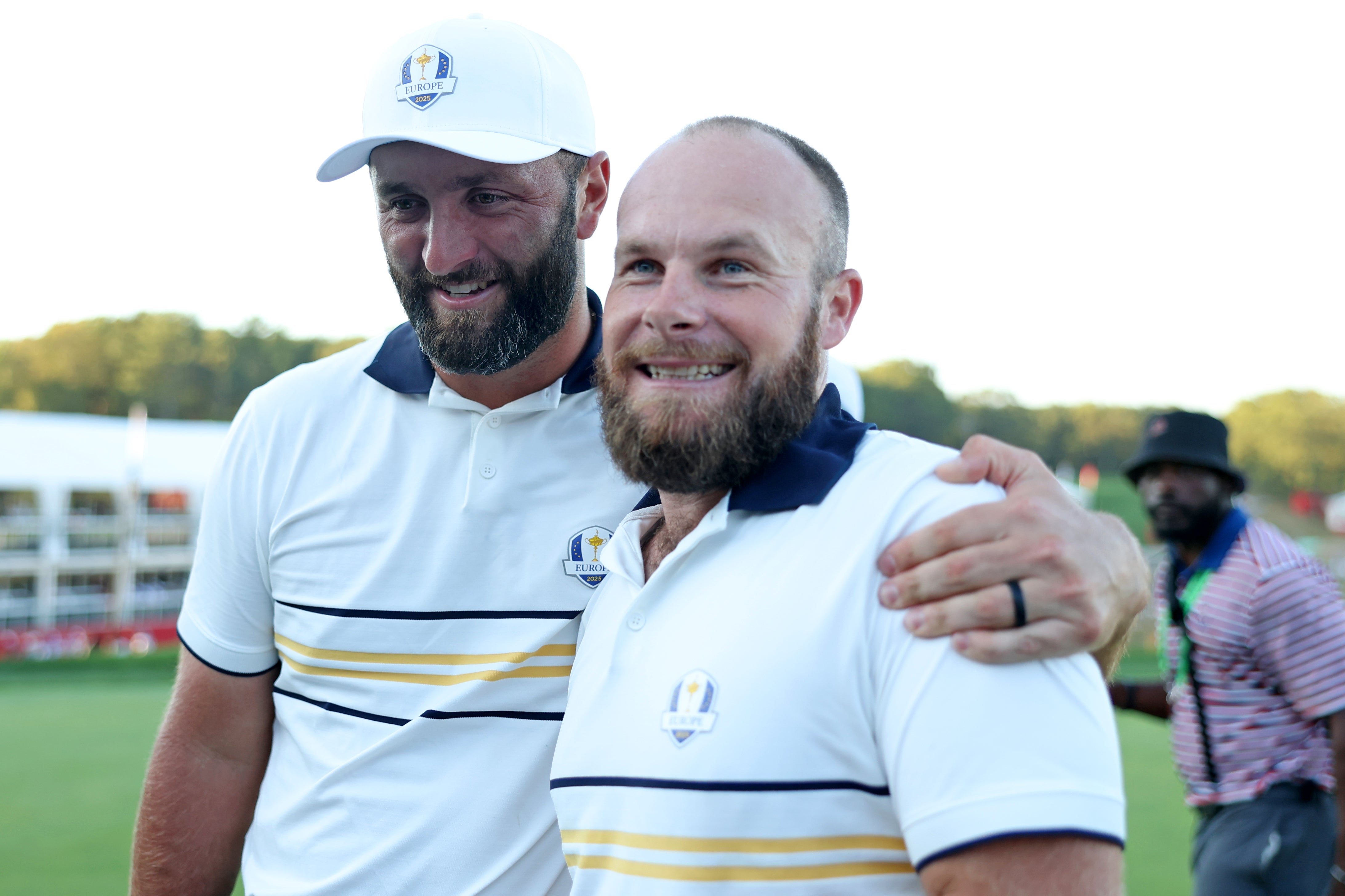 <p>Jon Rahm (left) may miss out on next year’s Ryder Cup but Tyrrell Hatton (right) has settled his dispute</p>