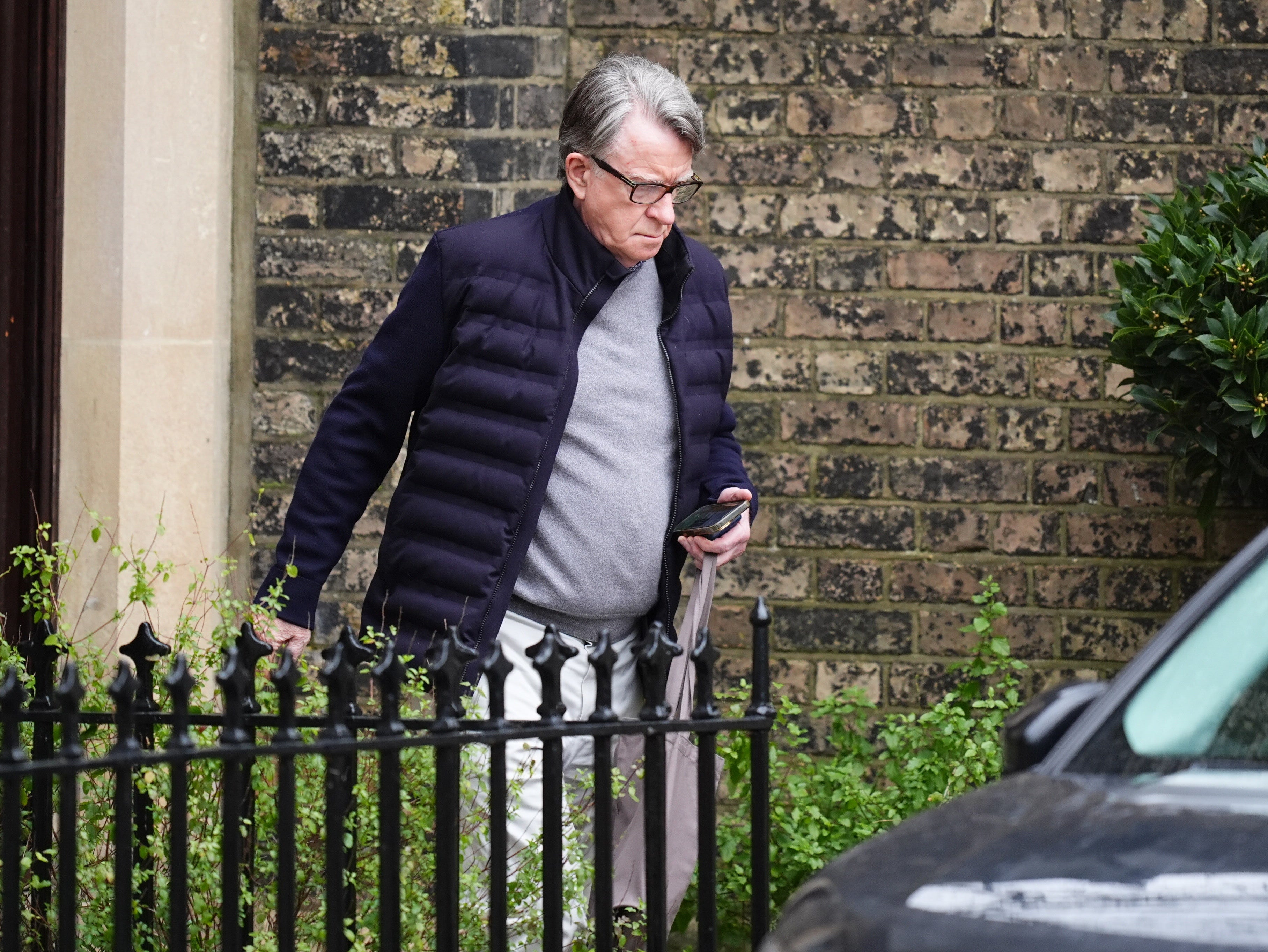 Mandelson was seen leaving his home on Saturday
