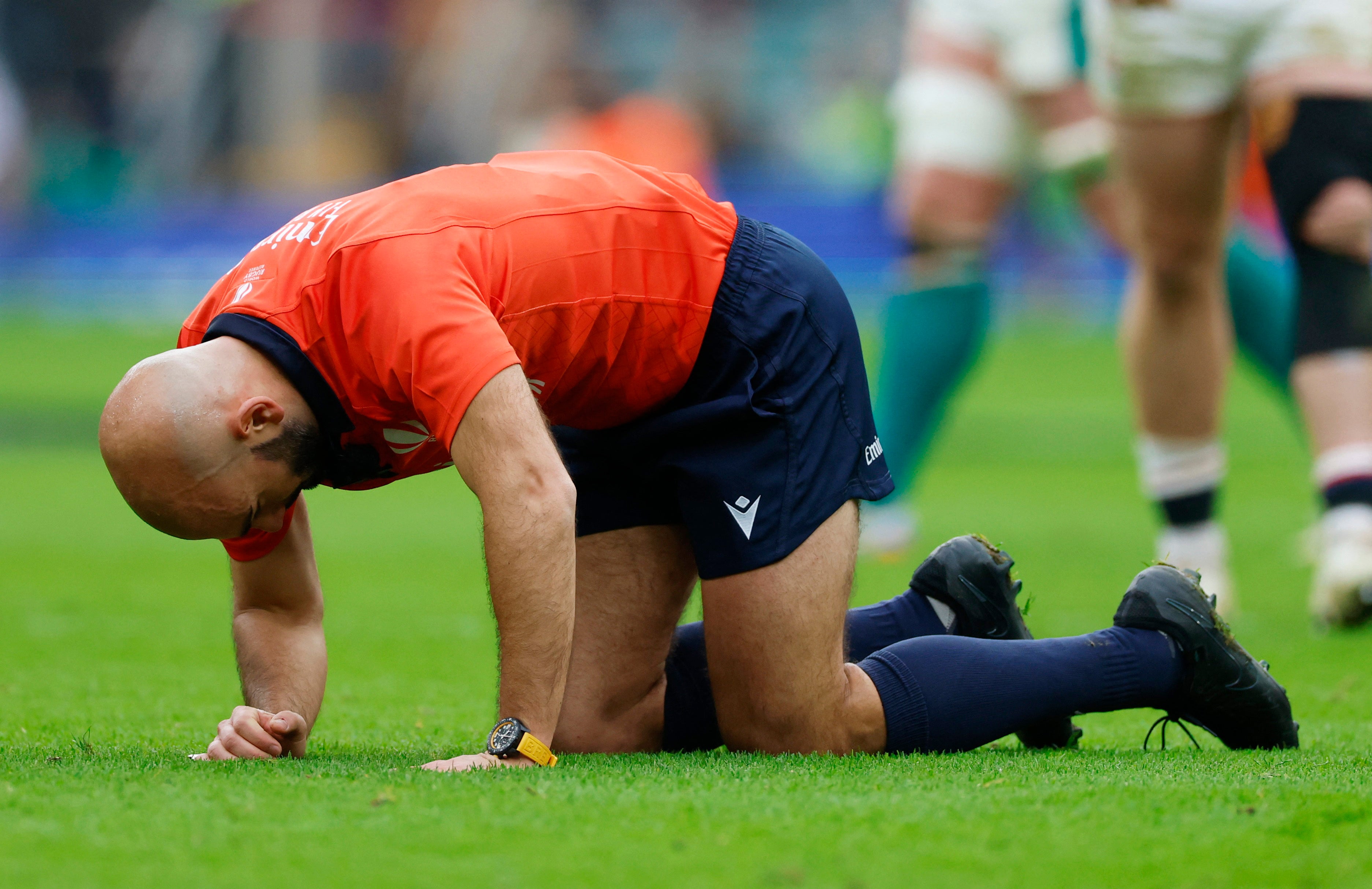 <p>Andrea Piardi crumpled to the grass in pain</p>