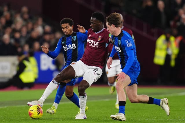 West Ham’s Soungoutou Magassa battles with Amine Adli (left) and Alex Scott (John Walton/PA)