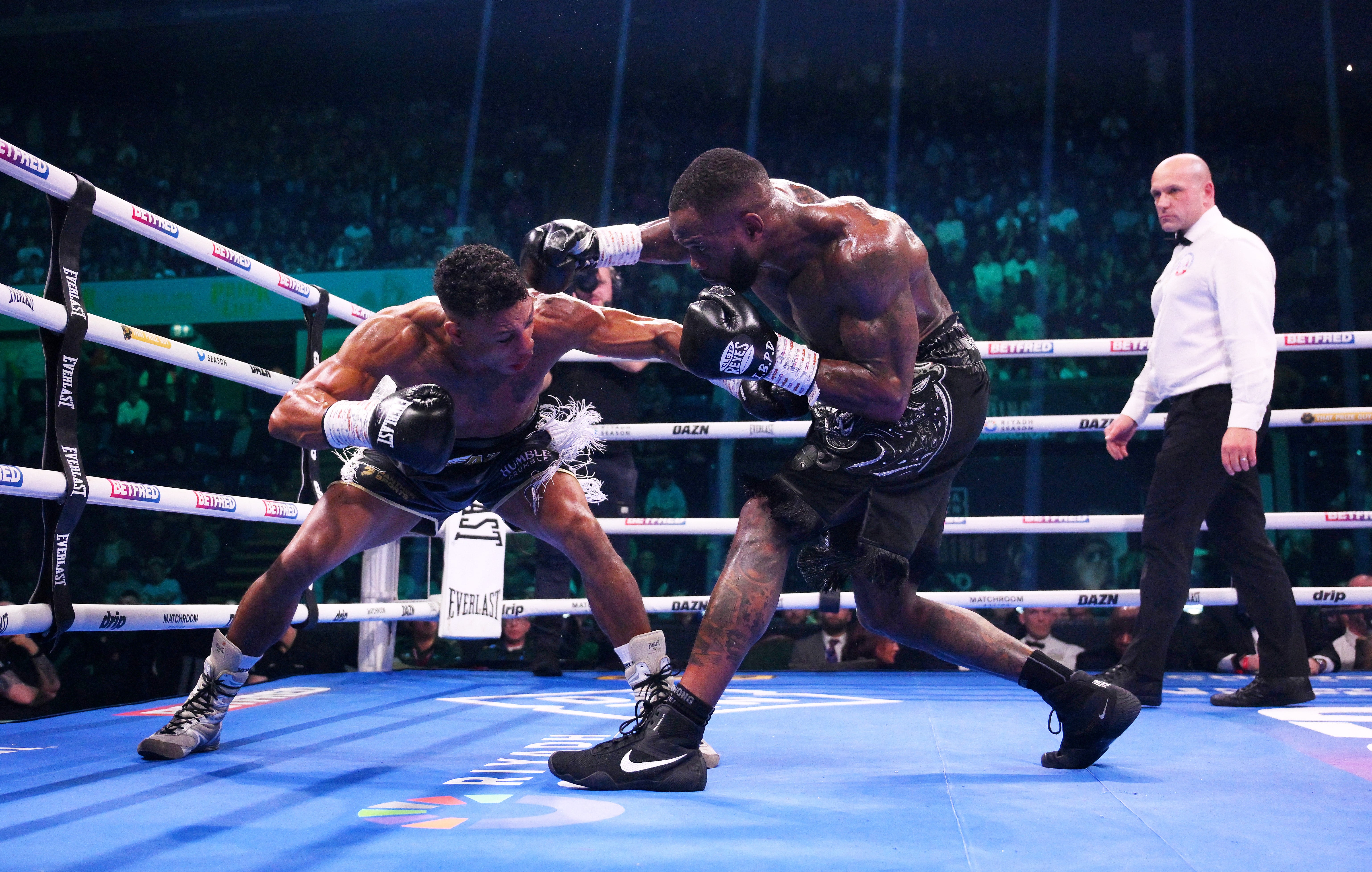 Bilal Fawaz (left) in action against Ishmael Davis