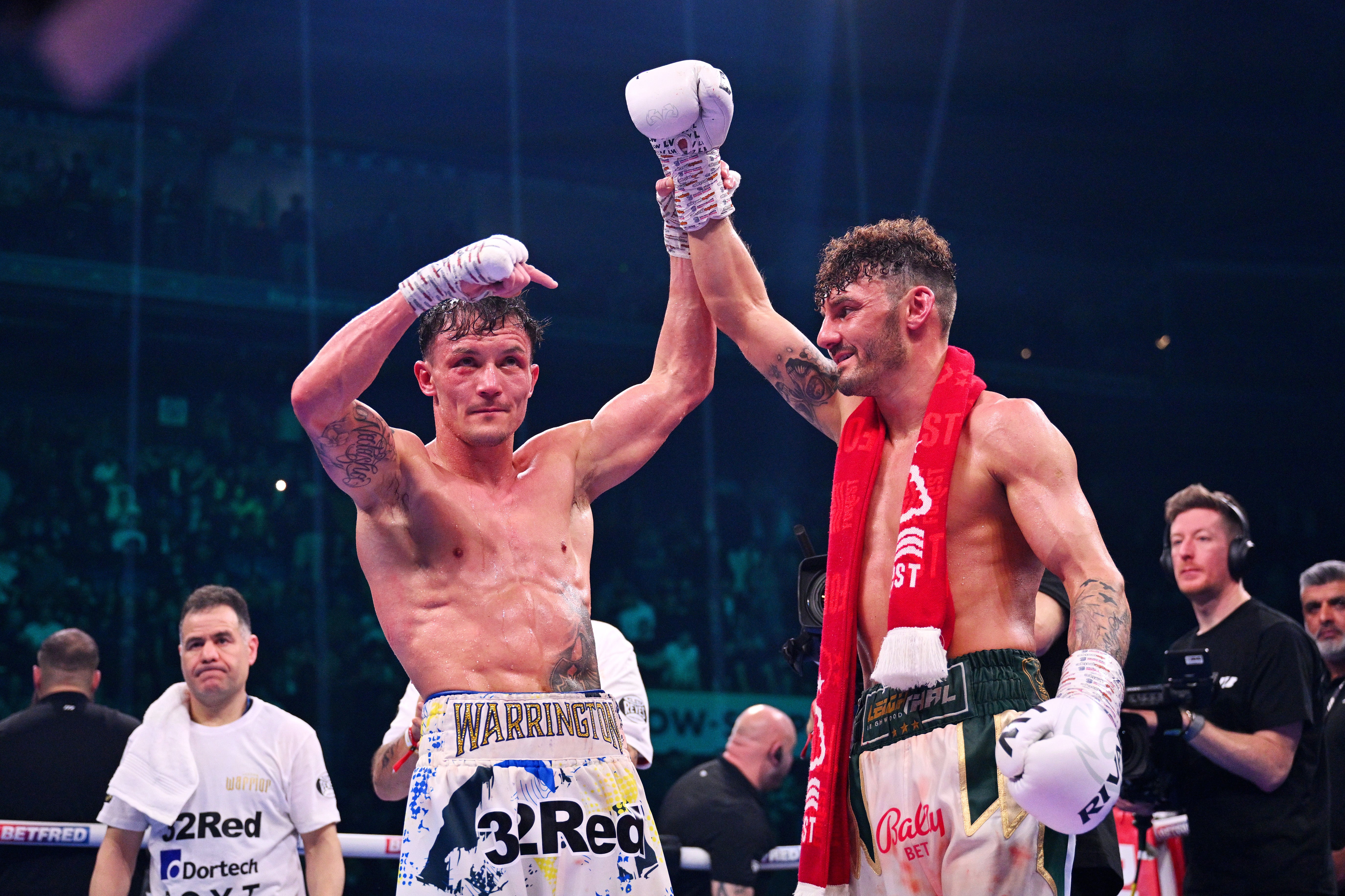 <p>Josh Warrington (left) commends Leigh Wood on another win over him</p>