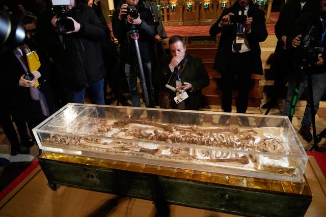 <p>Journalists view the remains of St Francis of Assisi before they go on public display</p>
