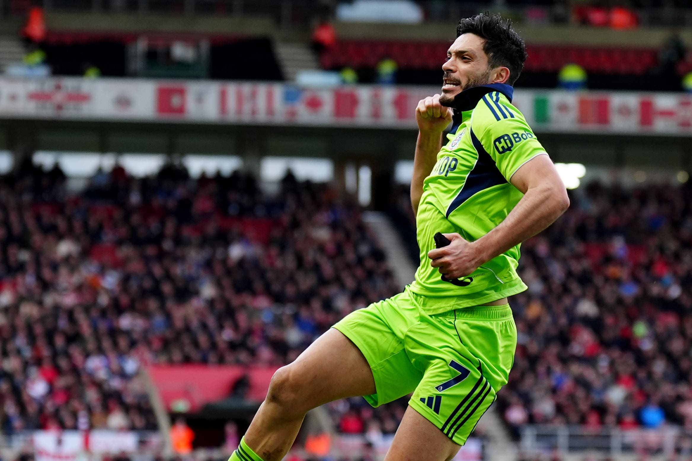 Raul Jimenez celebrates after opening the scoring (Owen Humphreys/PA)
