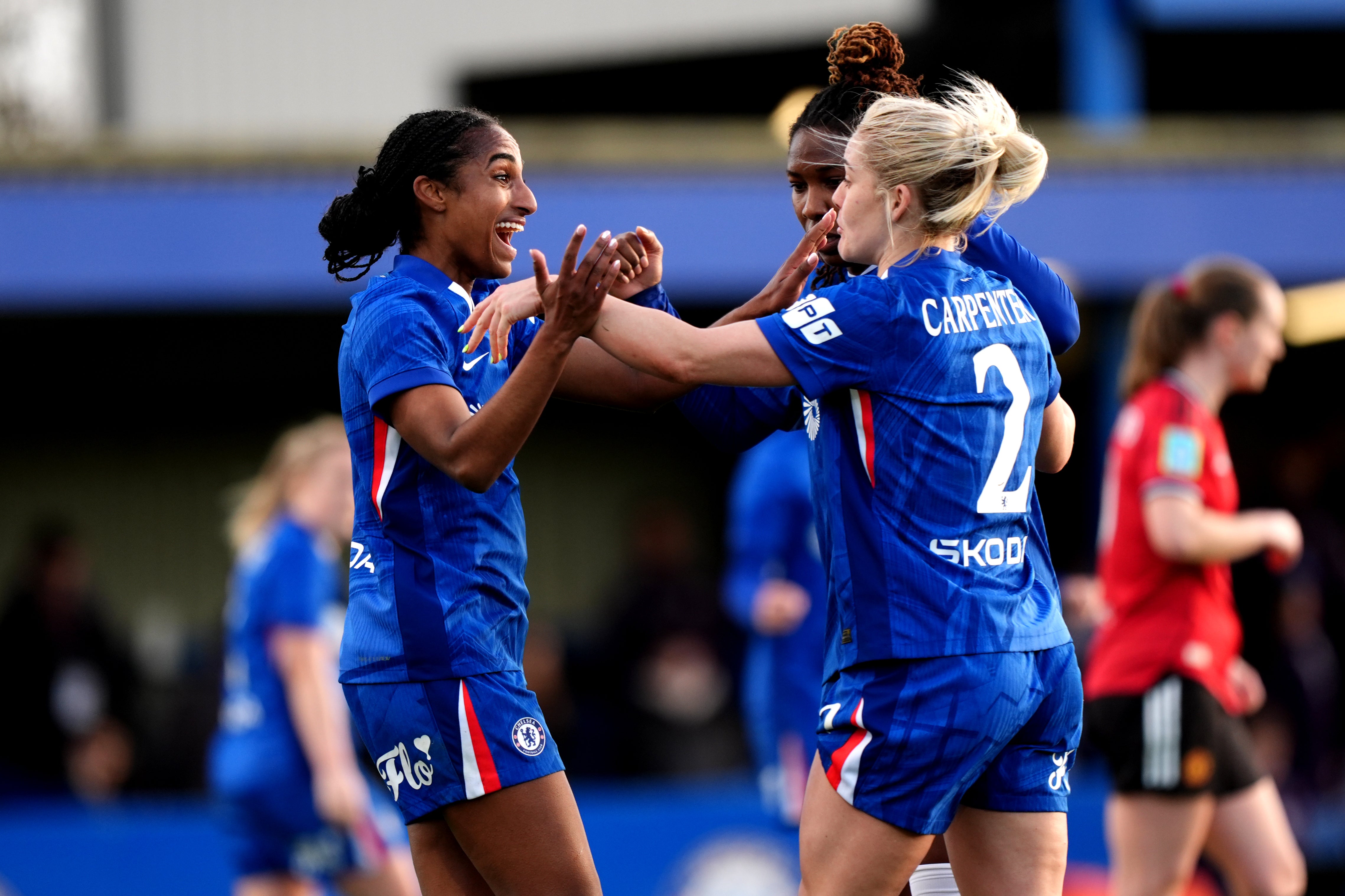 <p>Chelsea's Naomi Girma (left) celebrates at the final whistle </p>