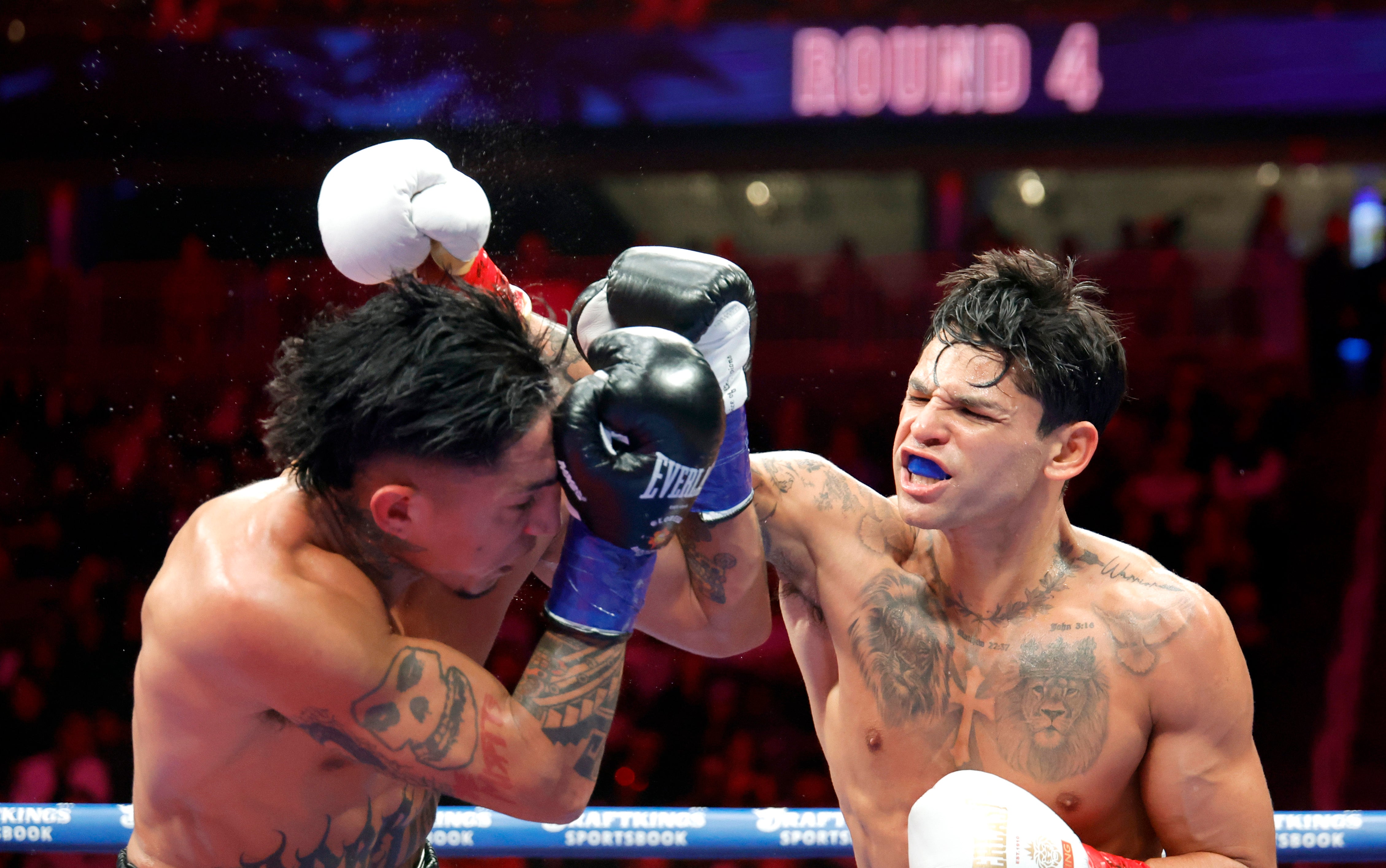 Ryan Garcia (right) during his win over Mario Barrios