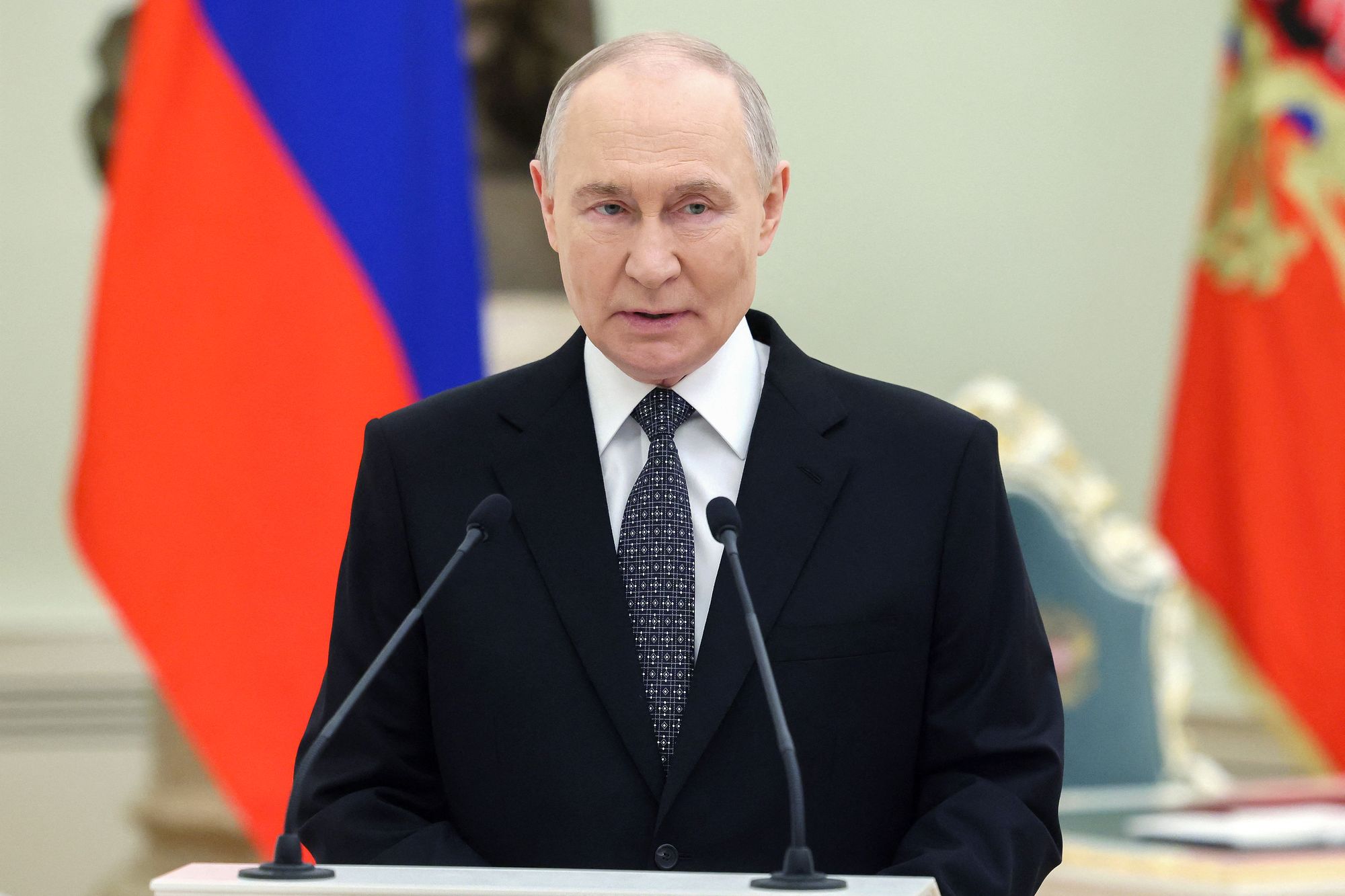 In this pool photograph distributed by the Russian state agency Sputnik, Russia's President Vladimir Putin delivers a speech at a ceremony to award servicemen with Gold Star medals of 'Hero of Russia' on Defender of the Fatherland Day in Moscow on February 23, 2026. (Photo by Mikhail METZEL / POOL / AFP via Getty Images)