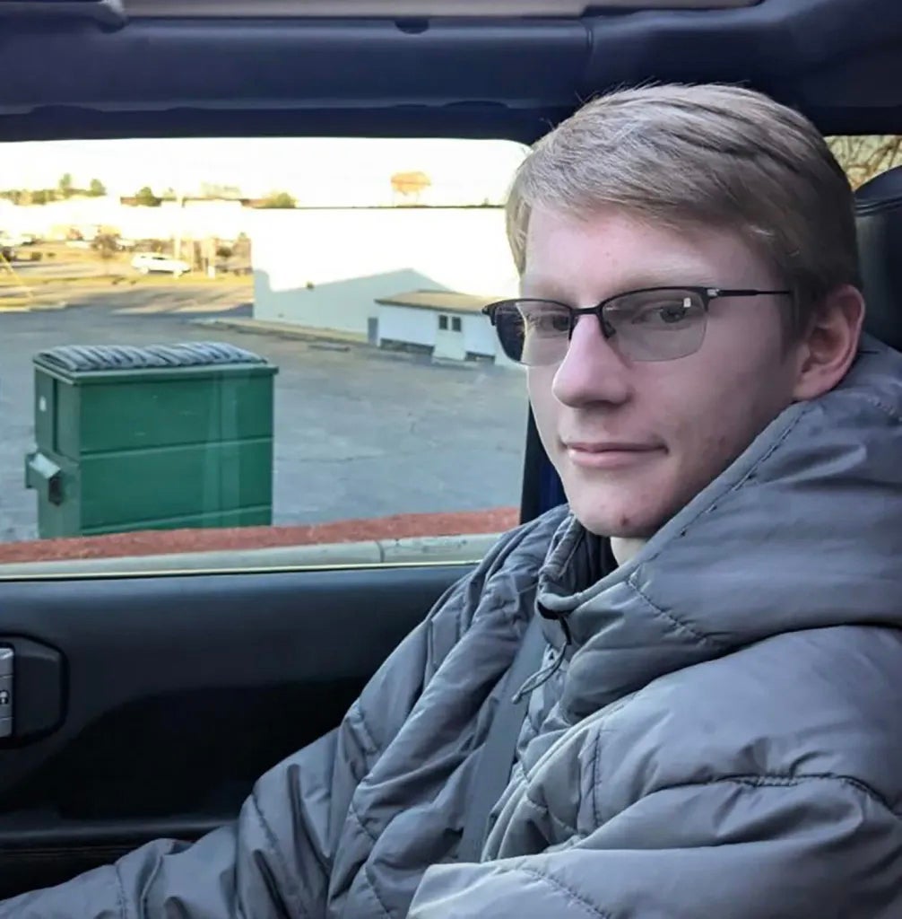 <p>Austin Tucker Martin, 21, was an avid Trump supporter who became concerned by the prospect of a government cover-up over the Epstein files</p>