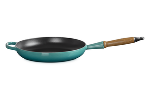 Le Creuset stoneware cast iron frying pan with wooden handle