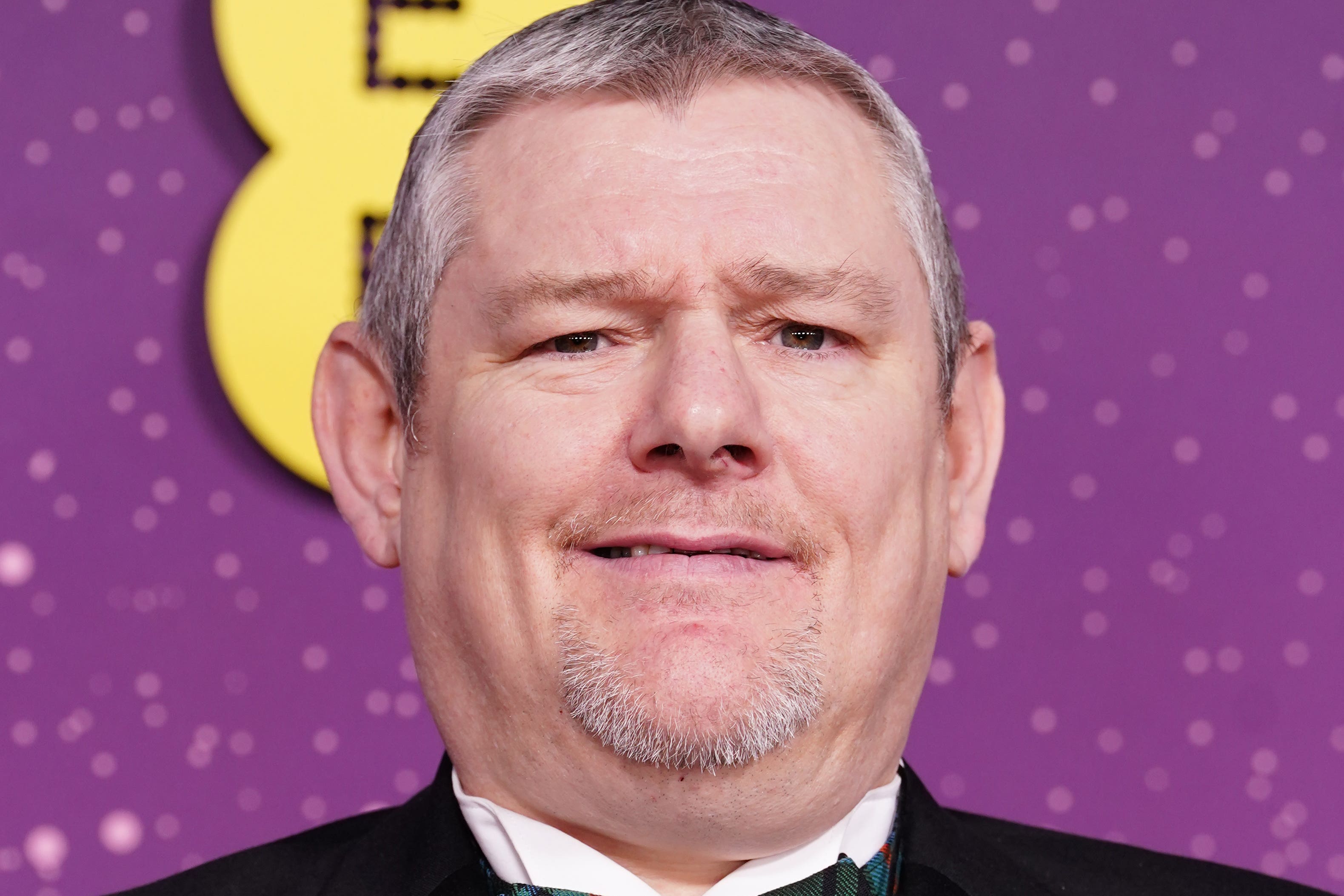 John Davidson at the Baftas (Ian West/PA)