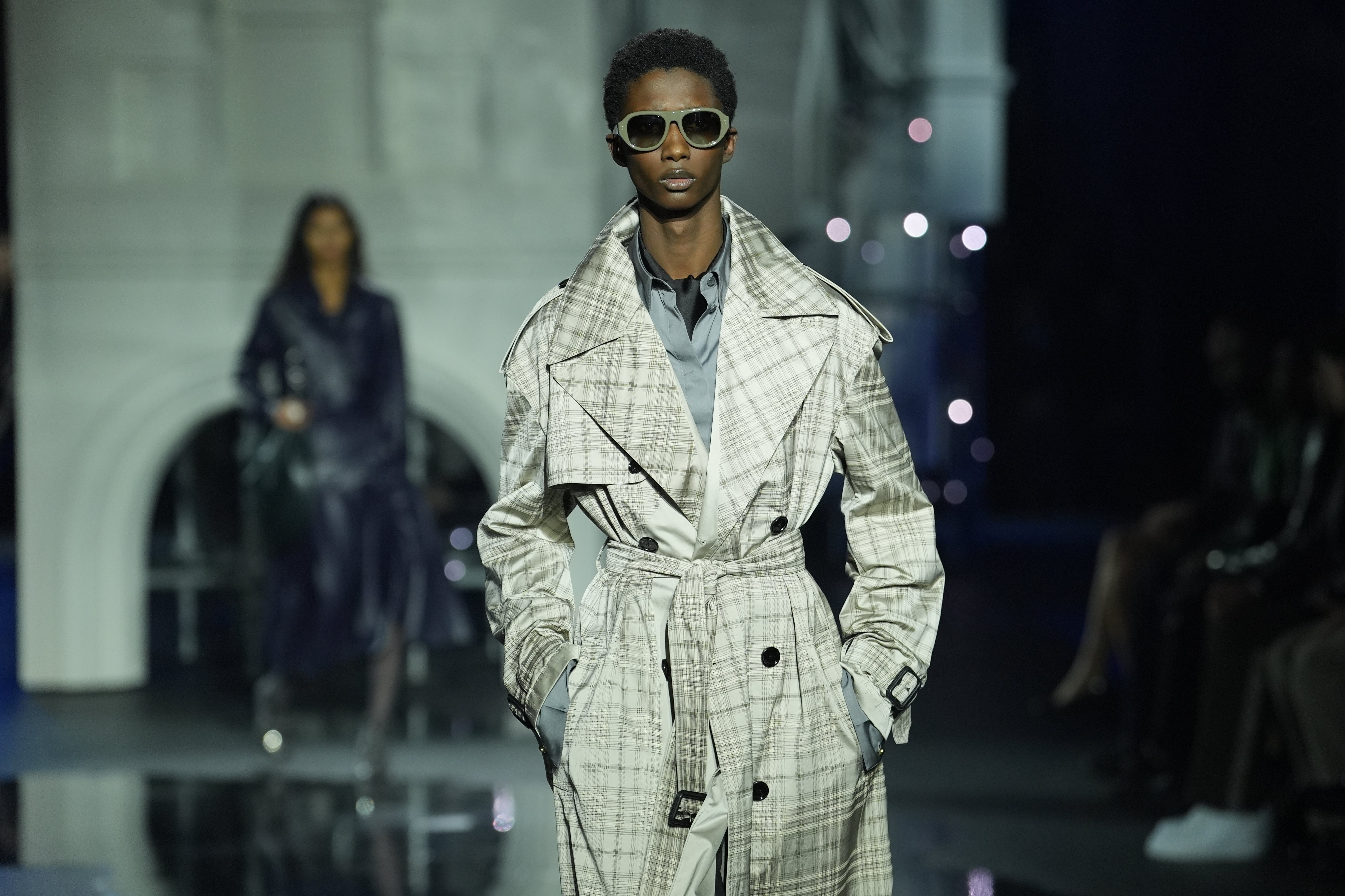 Burberry’s heritage check also made an appearance, reimagined in oversized trench coats