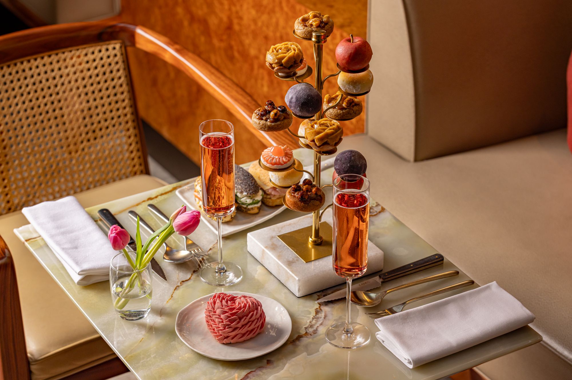 That apple poised at the top of the afternoon tea tower is not fruit – it’s actually a cake