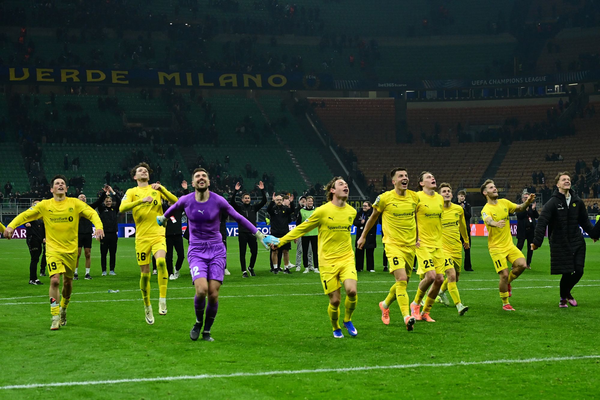 Bodo/Glimt's players celebrate their win at San Siro, as they reached the last-16 on their first ever season in the Champions League