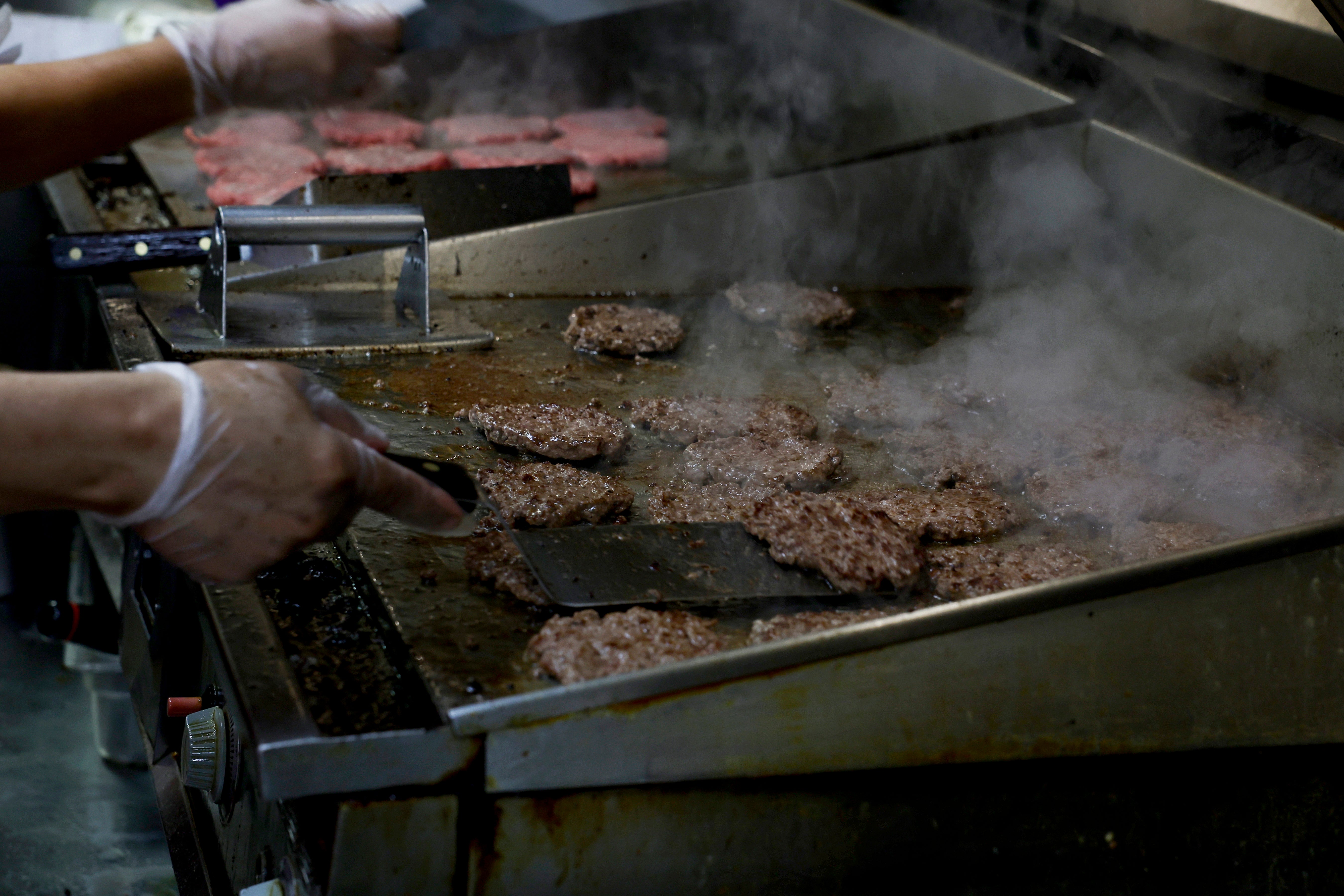 Burgers and other processed meats can raise your risk of developing colorectal cancer. But nearly half of 2,000 American adults say they were unaware of the risk in a new poll