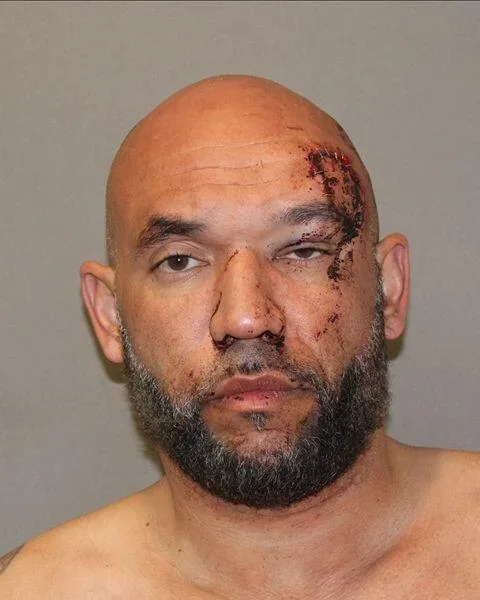 Anthony William Newhuis, 41, of Spring, Texas, was arrested Sunday in a Whataburger parking lot after allegedly attacking employees inside the burger joint