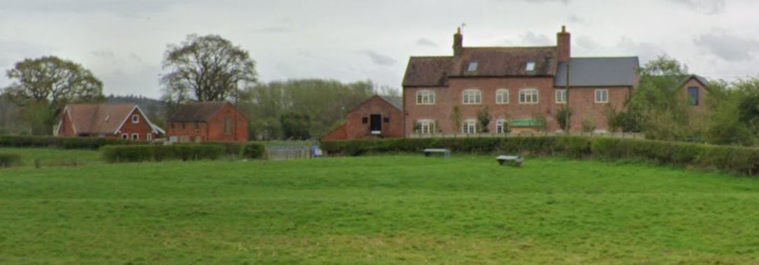 Muriel Whiston's house (far left) and Peter and Kelly Leonard's farmhouse on the right. There are Fenemere farm buildings in between.