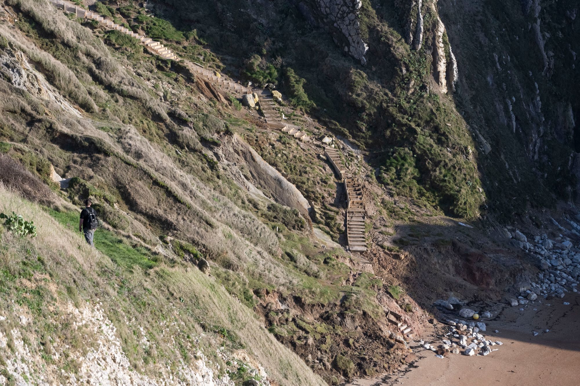 The bottom section of steps has been swept away