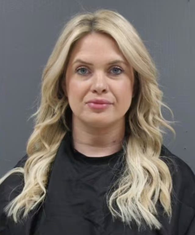 Social media reacts to boutique owner’s glamorous mugshot following