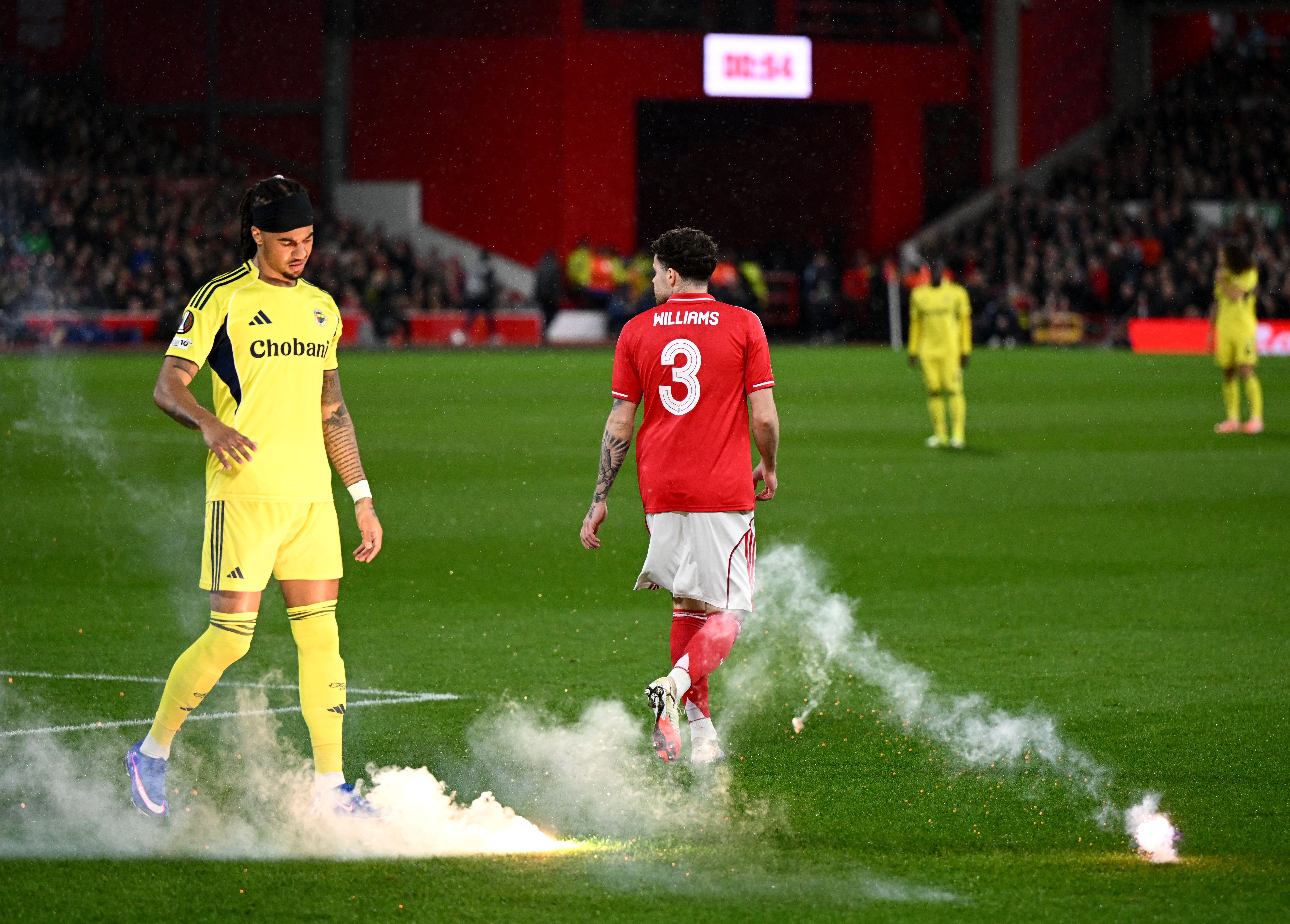 Nottingham Forest players dodge fireworks from away fans at Europa League play-off