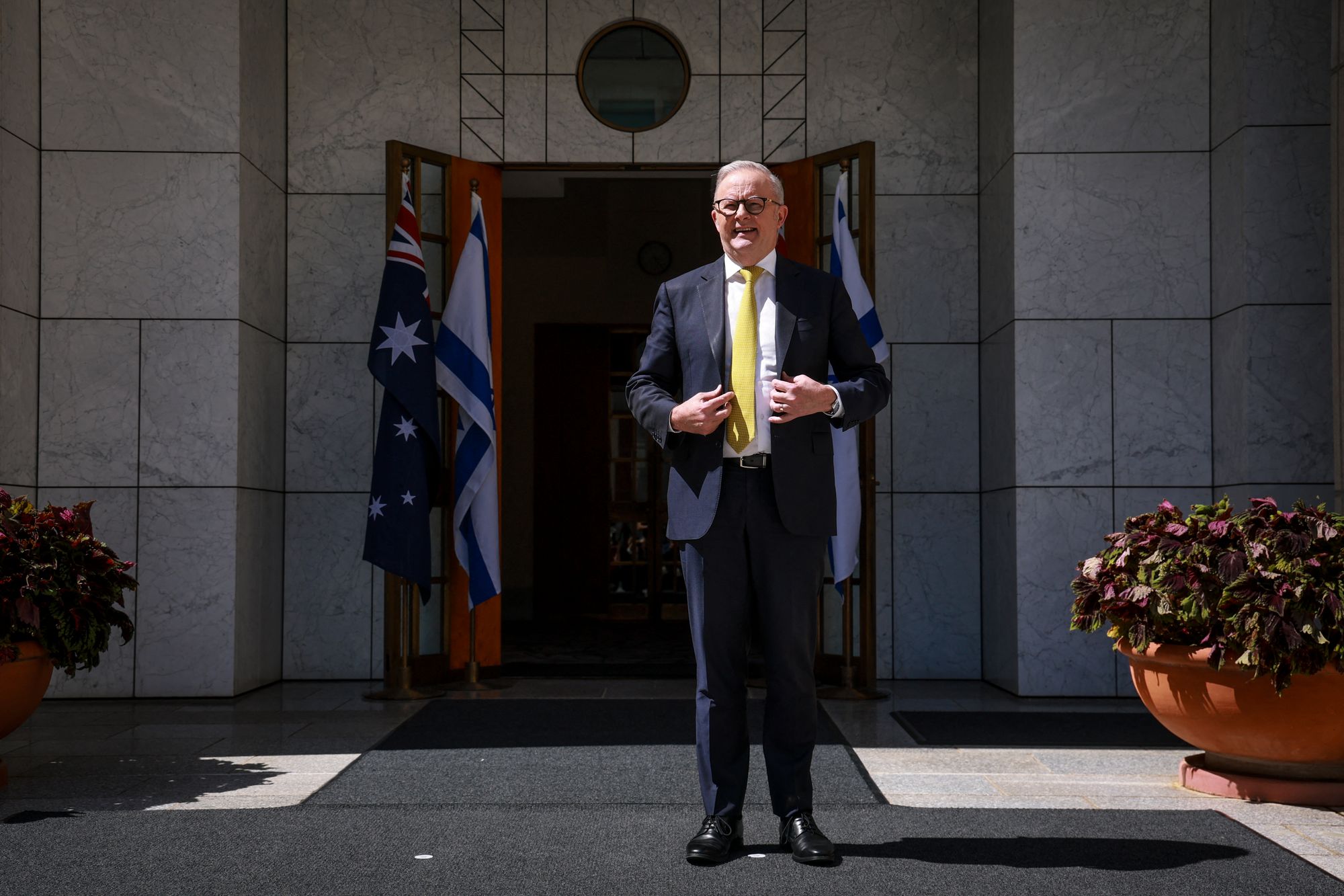 Anthony Albanese stands outside the entrance to his office in Canberra on 11 February 2026