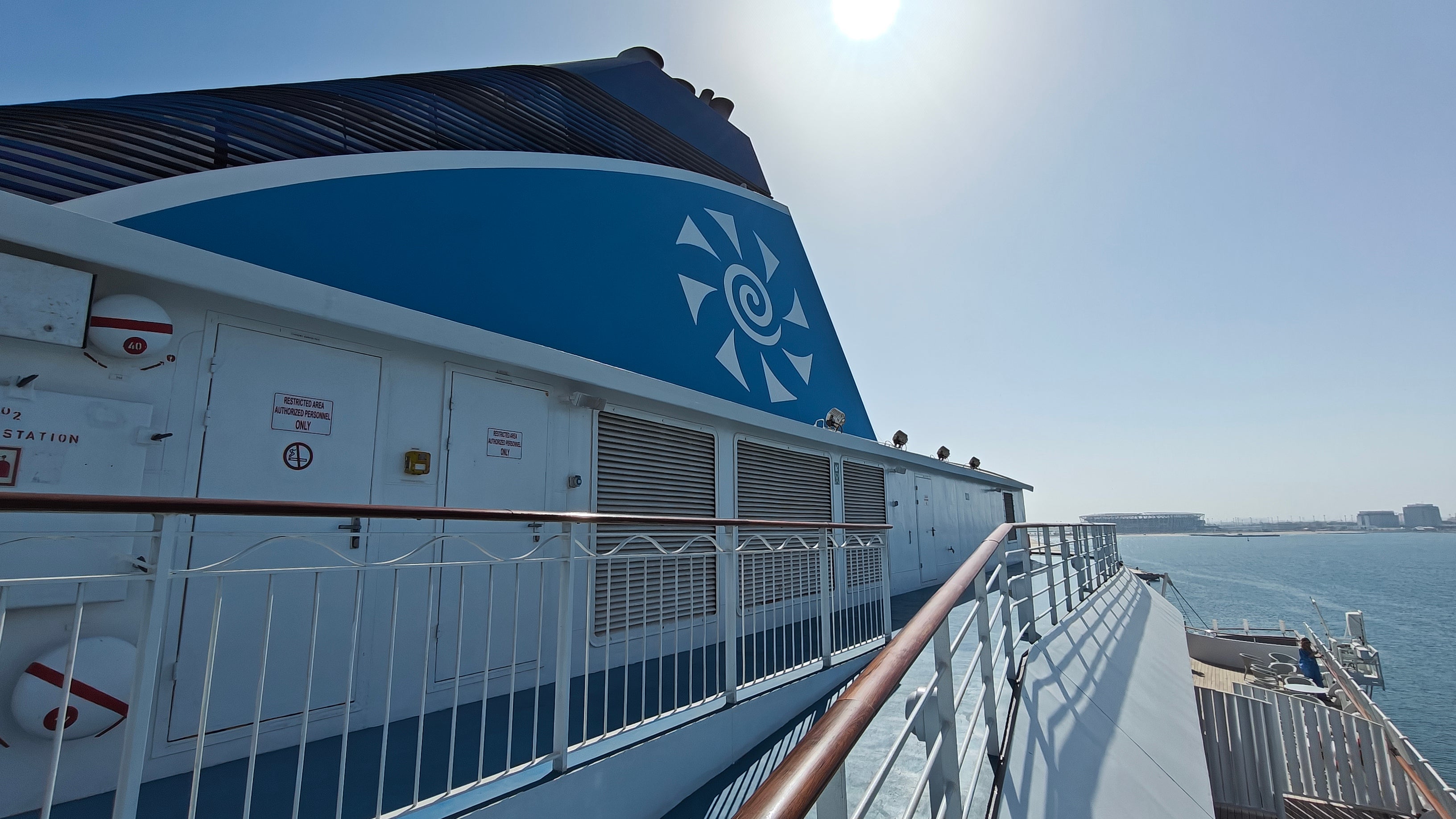 Celestyal Discovery sparkling in the sunshine as it navigates the Arabian Sea