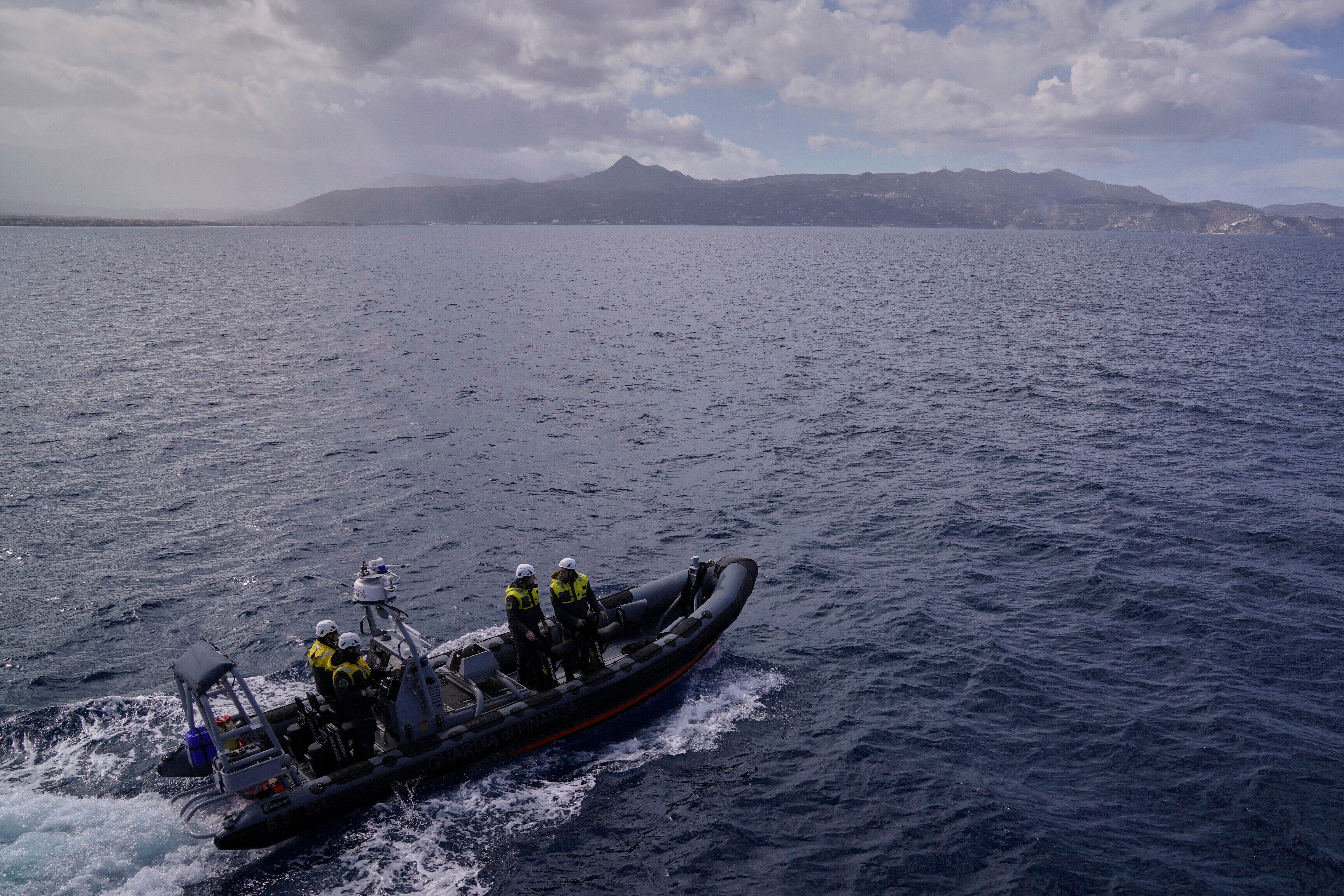 Frontex officers from the Italian Guardia Di Finanza OPV Osum patrol by speedboat on the Aegean Sea near Heraklion, Crete Island, Greece, Monday, Feb. 16, 2026. (AP Photo/Lefteris Pitarakis)