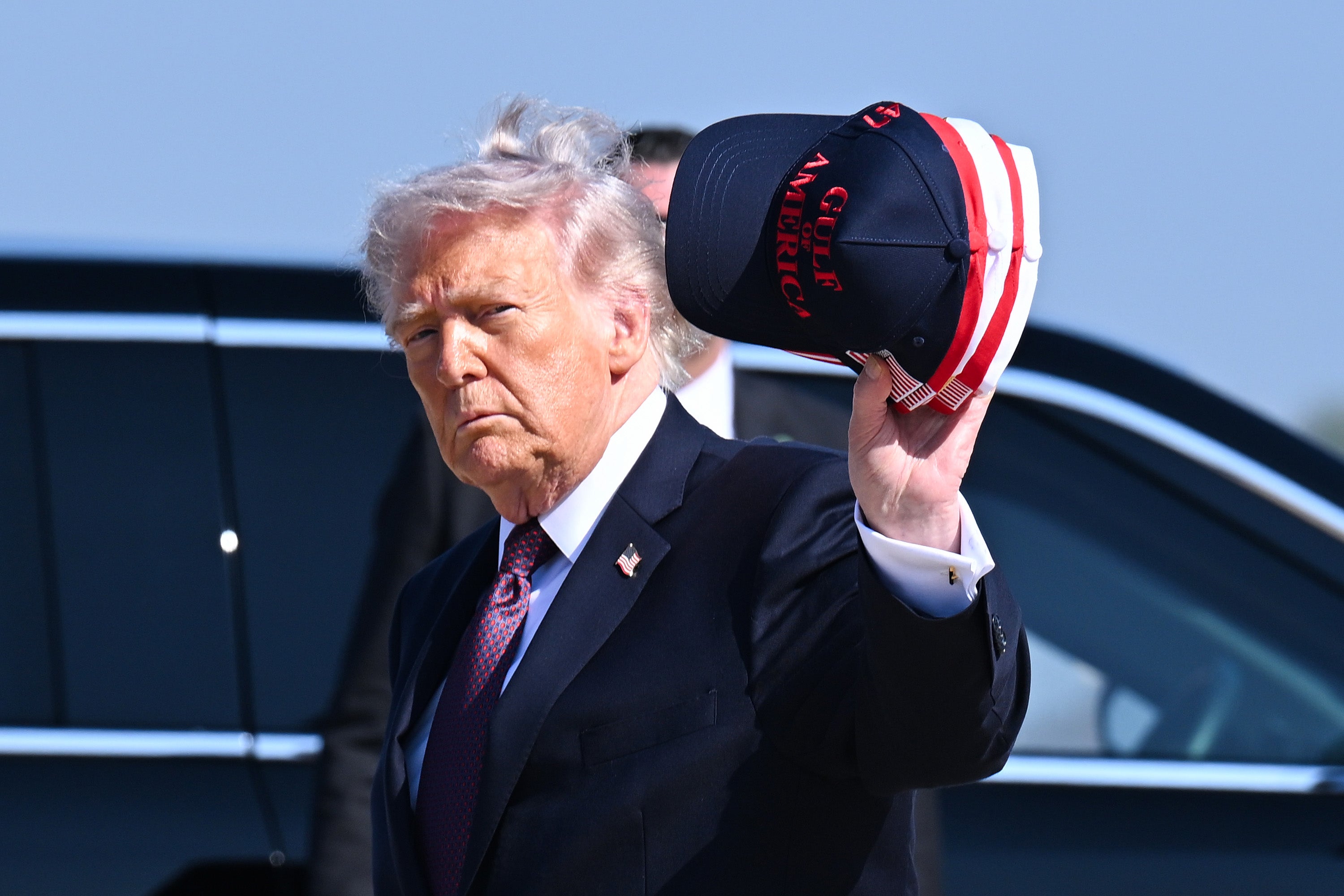 President Donald Trump waves a hat as he arrives at Corpus Christi International Airport on February 27, 2026 in Texas. One hour before he spoke at a campaign rally, Trump gave U.S. military officials the final order to begin a series of devastating strikes in Iran that have killed hundreds of people and sparked fears of a wider regional war.